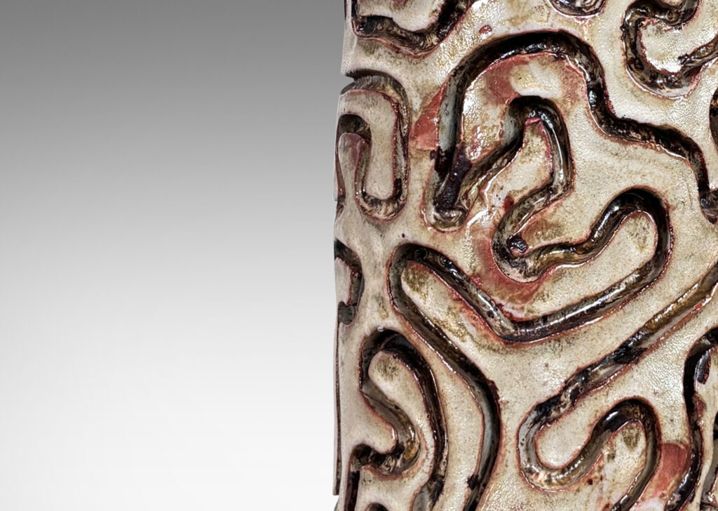 Gallery BAC columnar form with carved vermicelli pattern, glazed in pale gray and dark brown