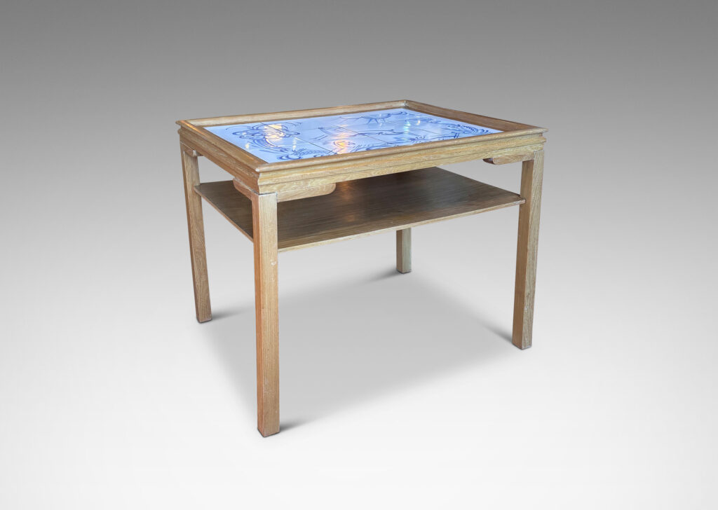 Gallery BAC rectangular top with sculpted lip, tapered legs and shelf, featuring a tile top surface in white glaze with charming hand-painted deer and landscape design in blue