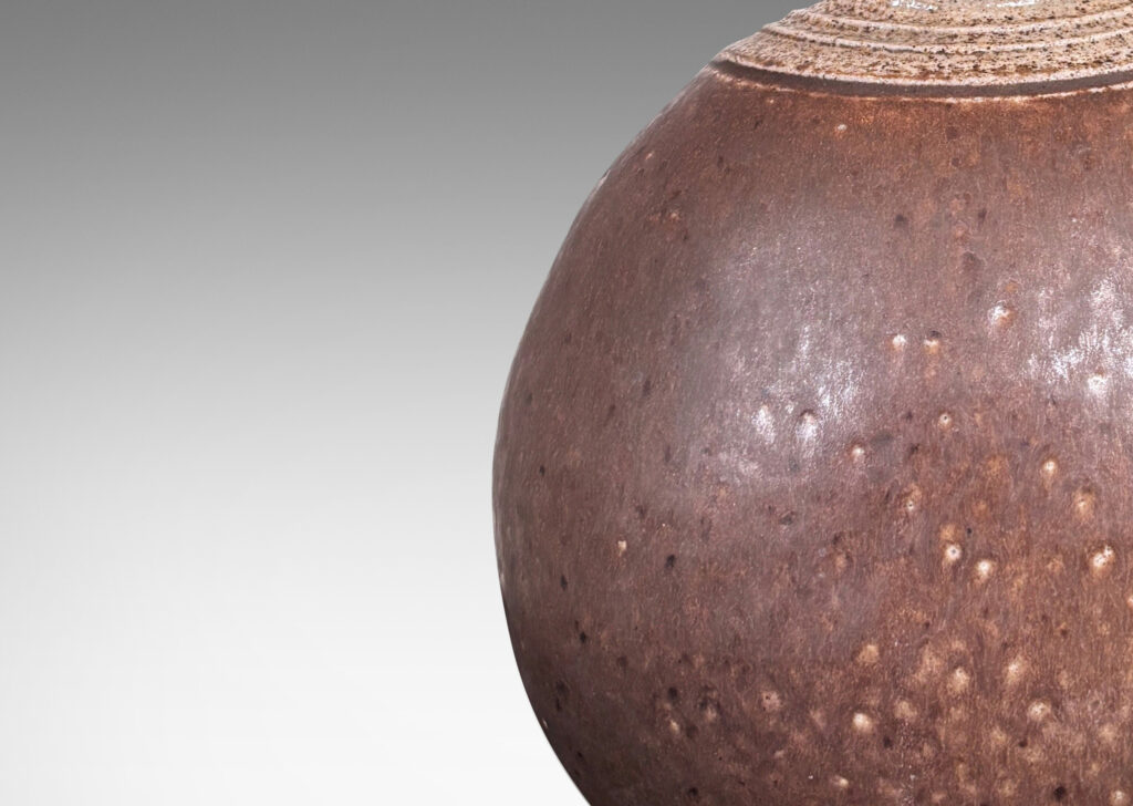 Gallery BAC pilgrim flask form, glazed in dark brown and stippled pale gray