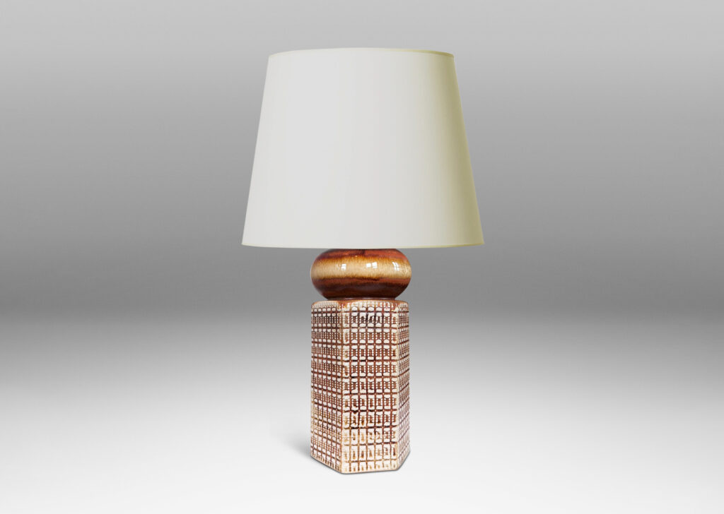 Gallery BAC hexagonal forms with gridded textural reliefs and bun-shaped caps, glazed in brown over ivory