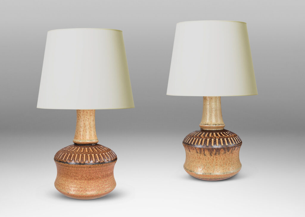 Gallery BAC drum forms with tall necks and intaglio reeded ring around shoulders, glazed in tan and brown