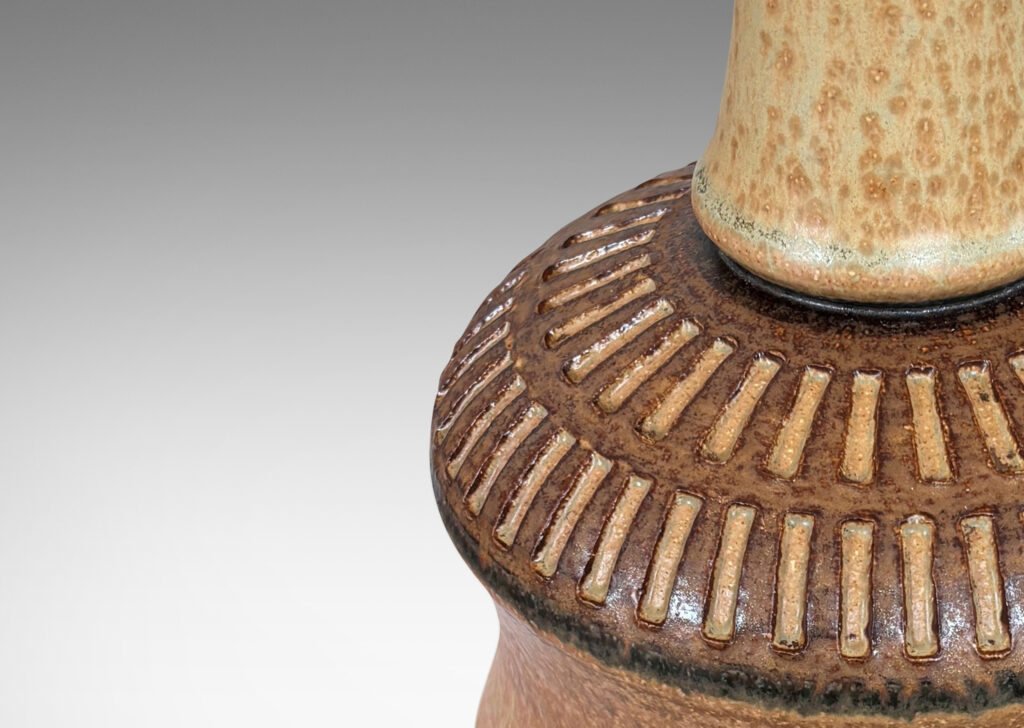 Gallery BAC drum forms with tall necks and intaglio reeded ring around shoulders, glazed in tan and brown