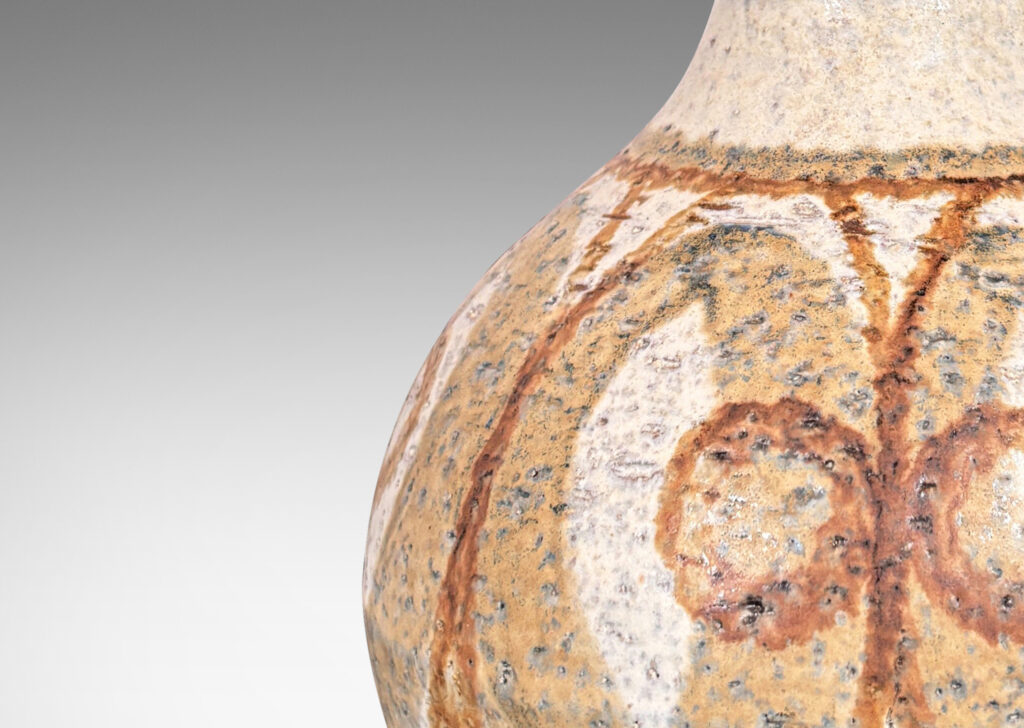 Gallery BAC globe form with sprouting neck, glazed in matte ivory with graphic geometric design in tan and brown