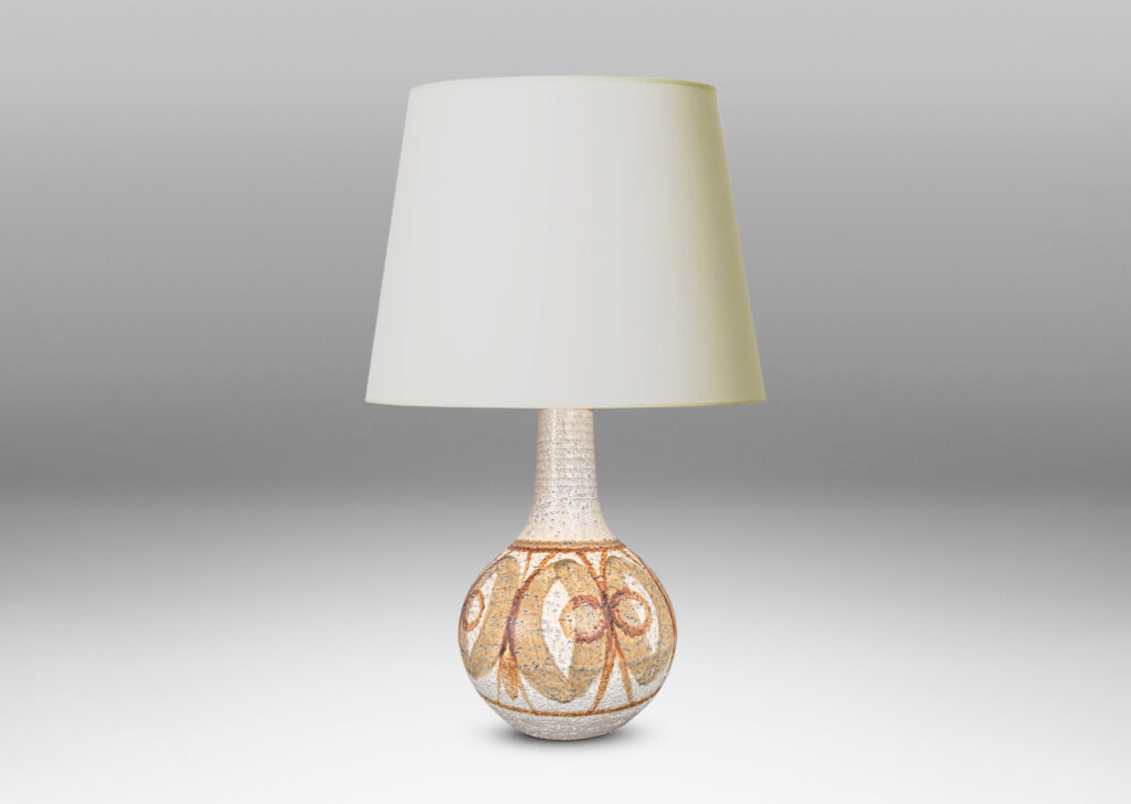 Gallery BAC globe form with sprouting neck, glazed in matte ivory with graphic geometric design in tan and brown
