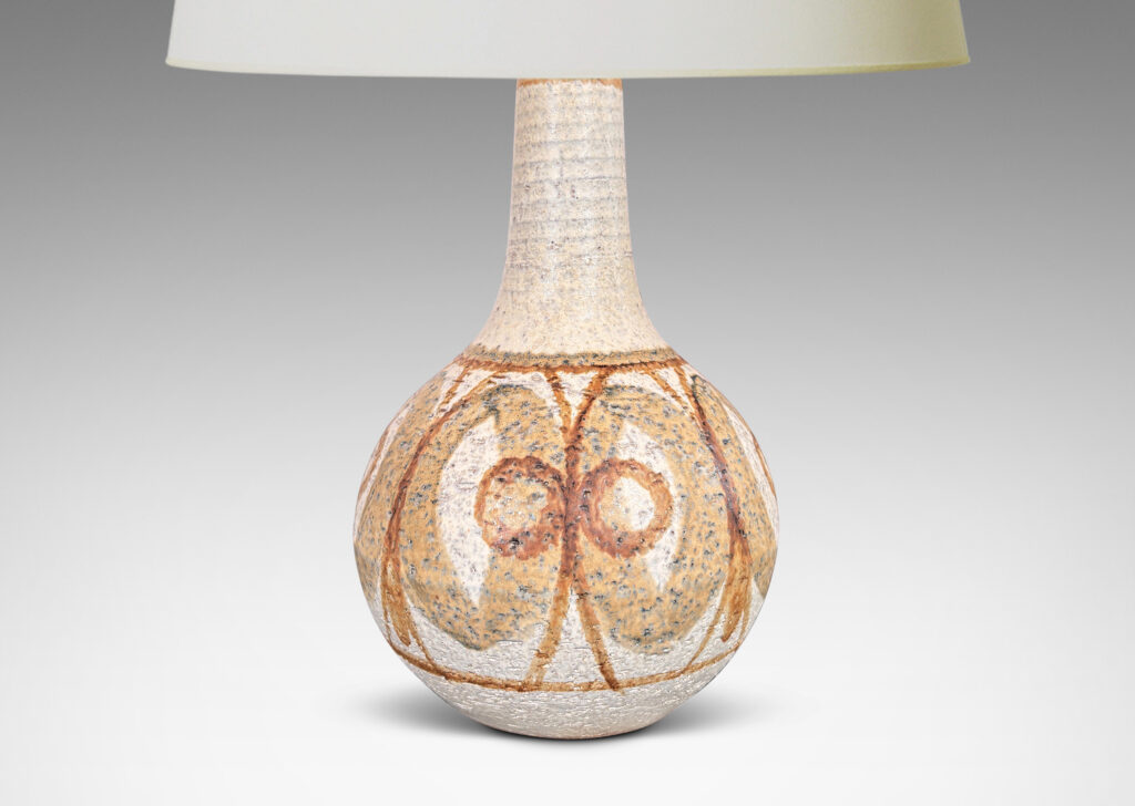 Gallery BAC globe form with sprouting neck, glazed in matte ivory with graphic geometric design in tan and brown