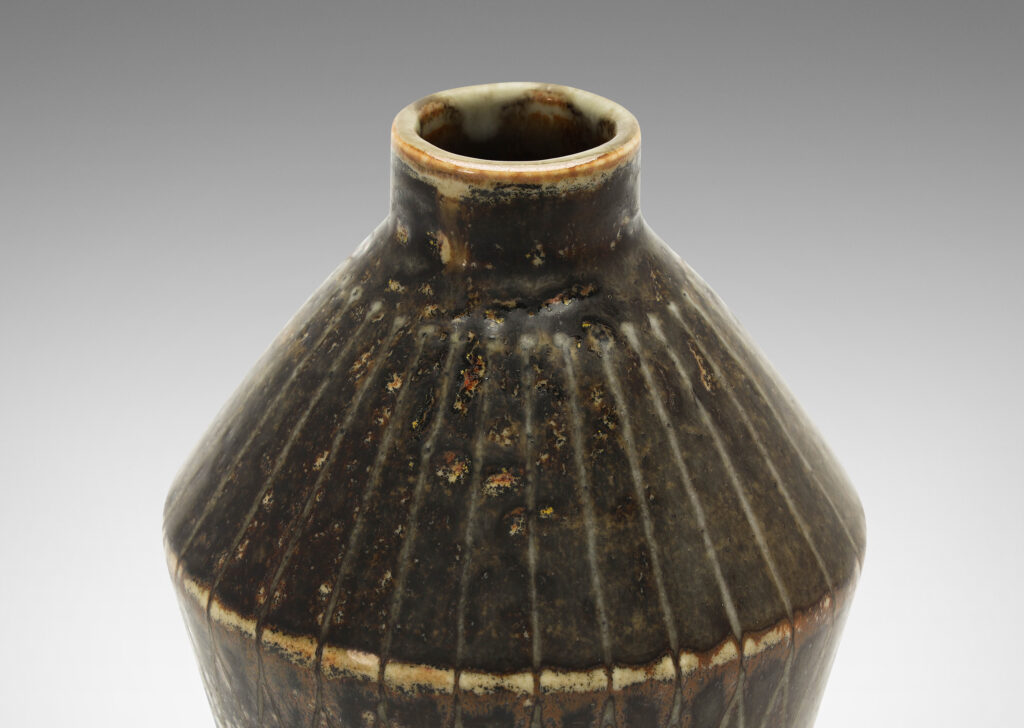 Gallery BAC angled tapered vase with carved radial lines and diamond pattern, glazed in gray-black