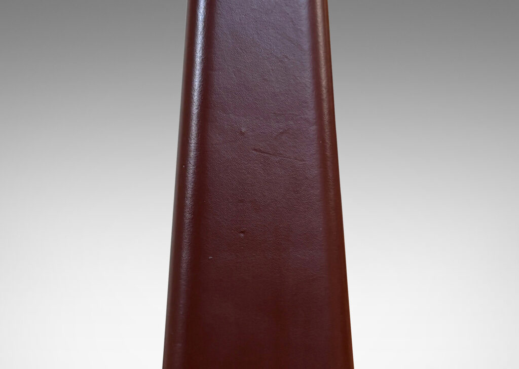 Gallery BAC obelisk form sheathed in stitched russet brown