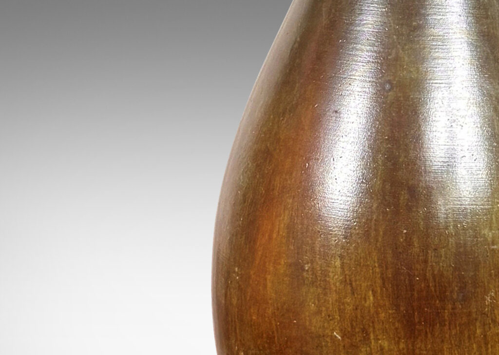 Gallery BAC sinuously modeled bud vase form with square plinth, with verdigris-accented patination