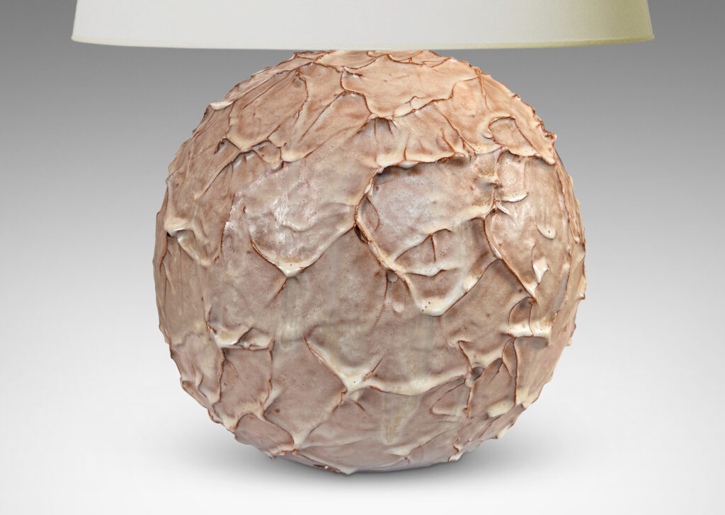 Gallery BAC highly textured globe form glazed in beige with brown tinted edges