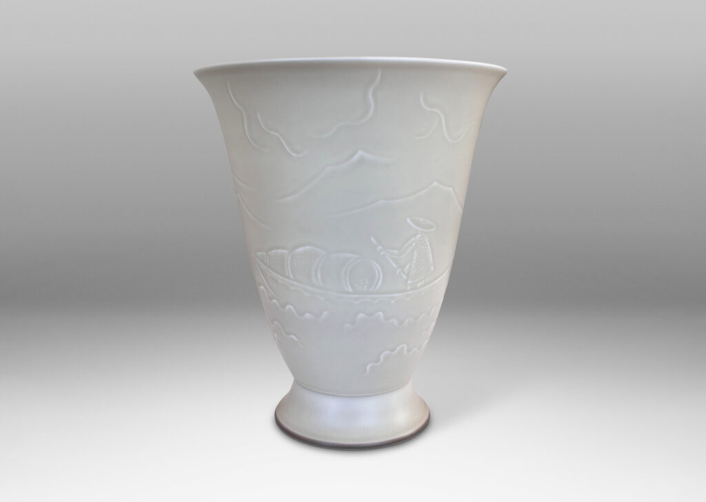 Gallery BAC lyre-form silhouette on a flanged stand, surrounded in stylized scenery in relief, glazed in a very pale gray