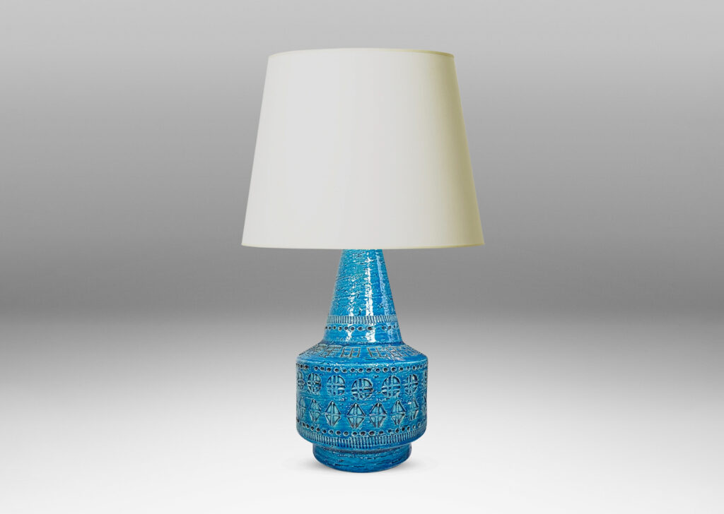 Gallery BAC floating drum form with conical neck, ornamented with impressed geometric motifs, glazed in a saturated cerulean blue