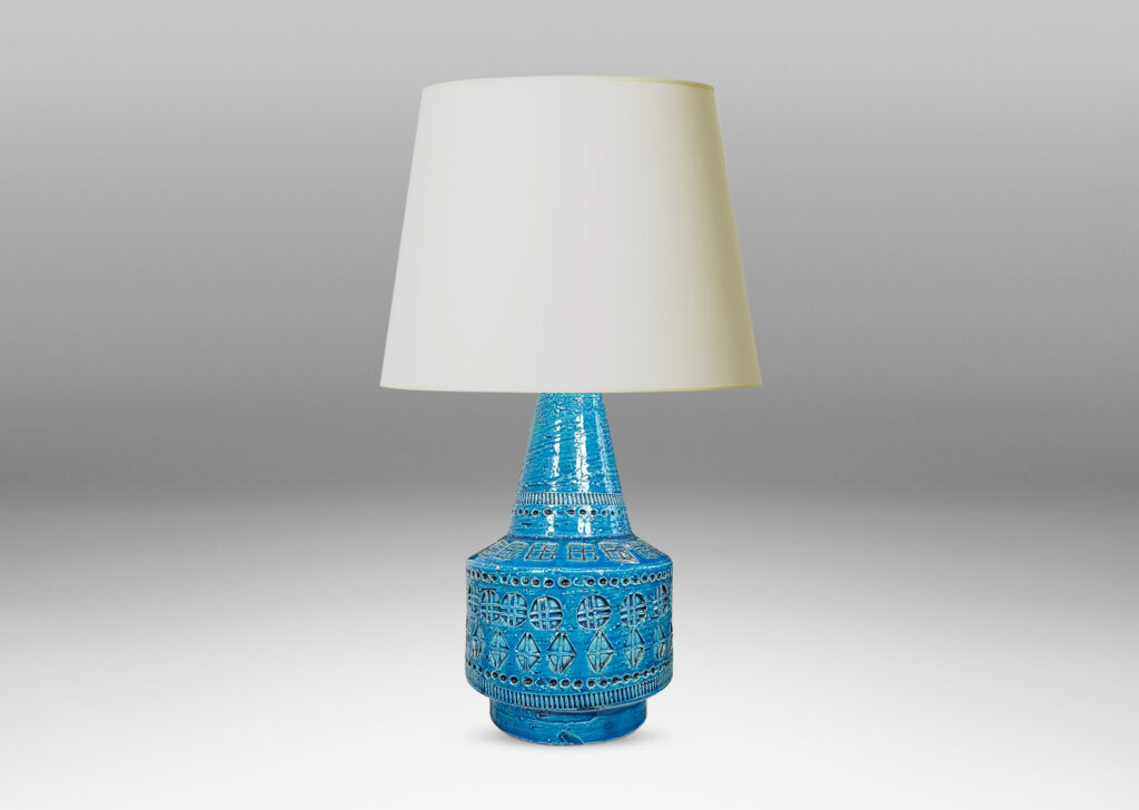 Gallery BAC floating drum form with conical neck, ornamented with impressed geometric motifs, glazed in a saturated cerulean blue