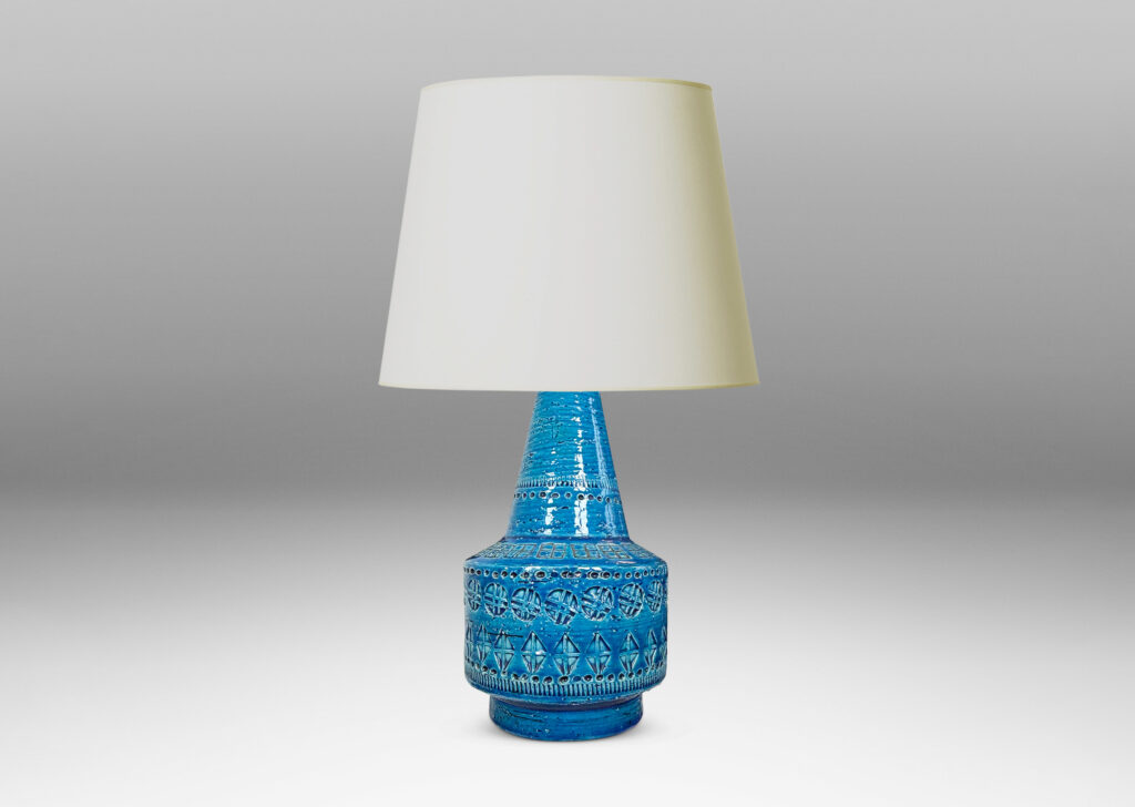 Gallery BAC floating drum form with conical neck, ornamented with impressed geometric motifs, glazed in a saturated cerulean blue