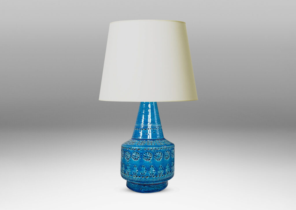 Gallery BAC floating drum form with conical neck, ornamented with impressed geometric motifs, glazed in a saturated cerulean blue