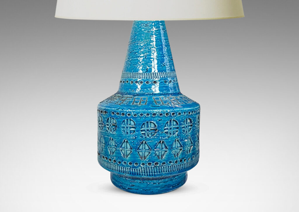 Gallery BAC floating drum form with conical neck, ornamented with impressed geometric motifs, glazed in a saturated cerulean blue