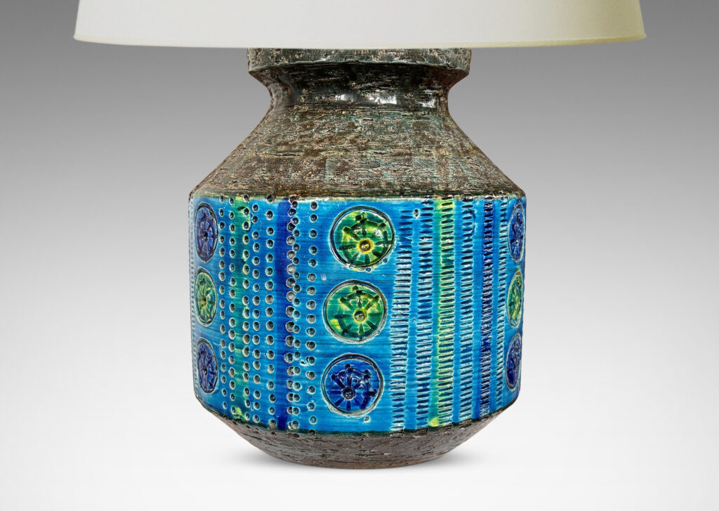Gallery BAC floating drum form with chamfered edges and carved rosette, strikes and dots, glazed in azure, blue, green and dark gray