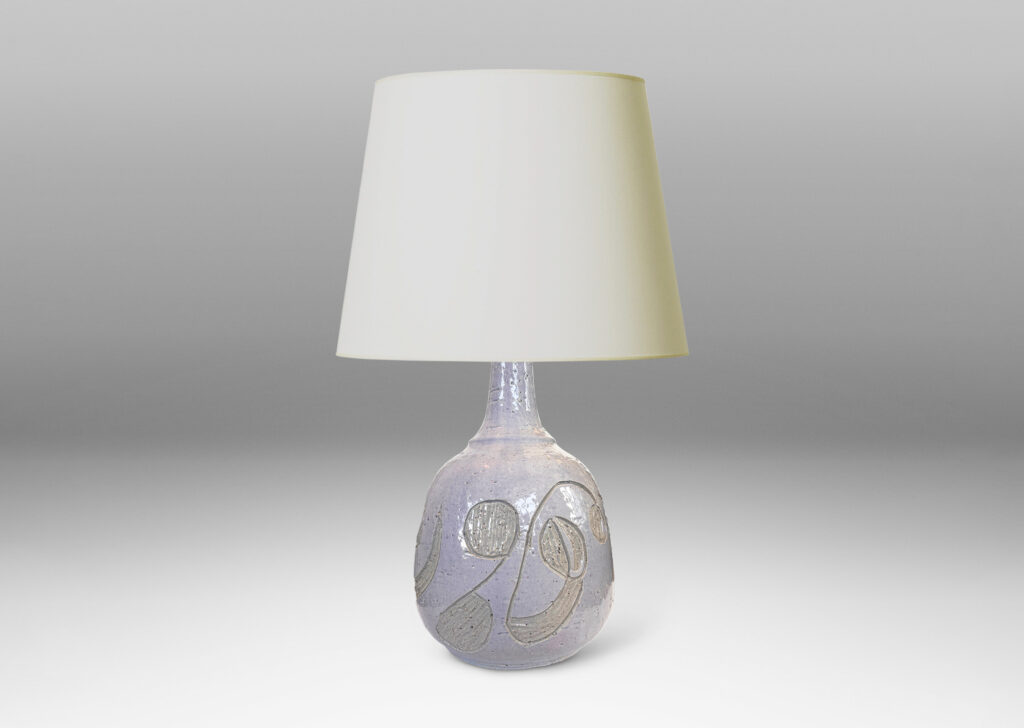 Gallery BAC ample ovoid form with sprouting neck and carved abstract floral ornaments, glazed in glossy pale gray and ivory