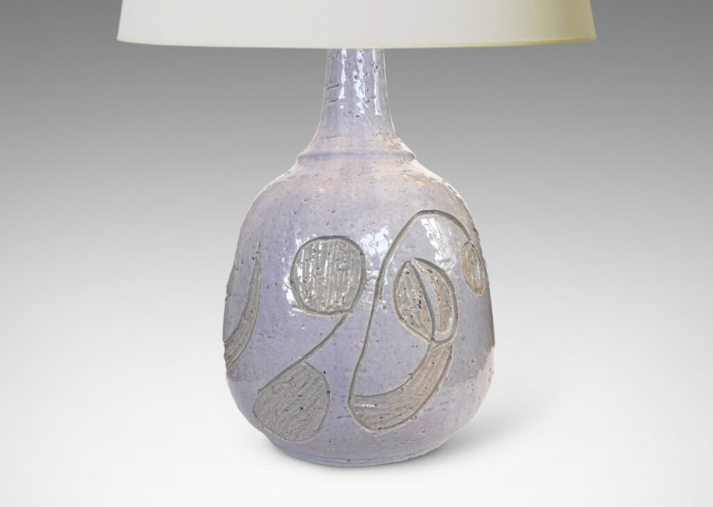 Gallery BAC ample ovoid form with sprouting neck and carved abstract floral ornaments, glazed in glossy pale gray and ivory