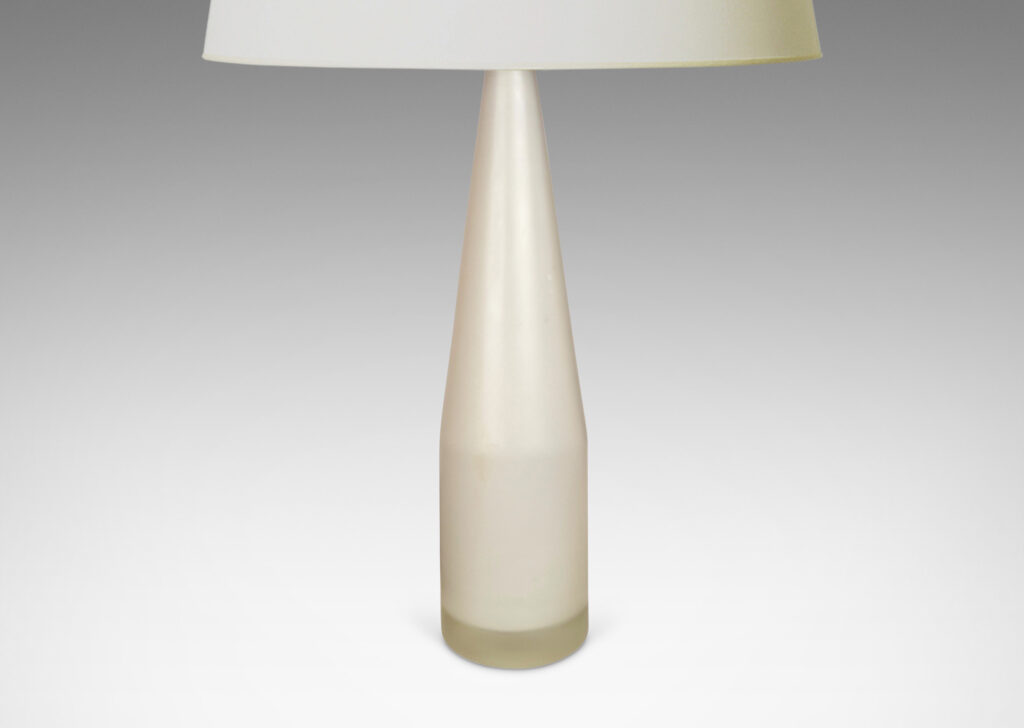 Gallery BAC slender upward tapering cylindrical forms with a velvety sand-blasted finish white within clear glass