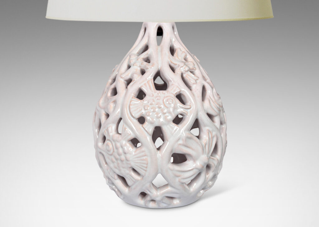 Gallery BAC drop form with openwork ogival pattern with reliefs of tropical fish, shells and flora, glazed in a shiny white