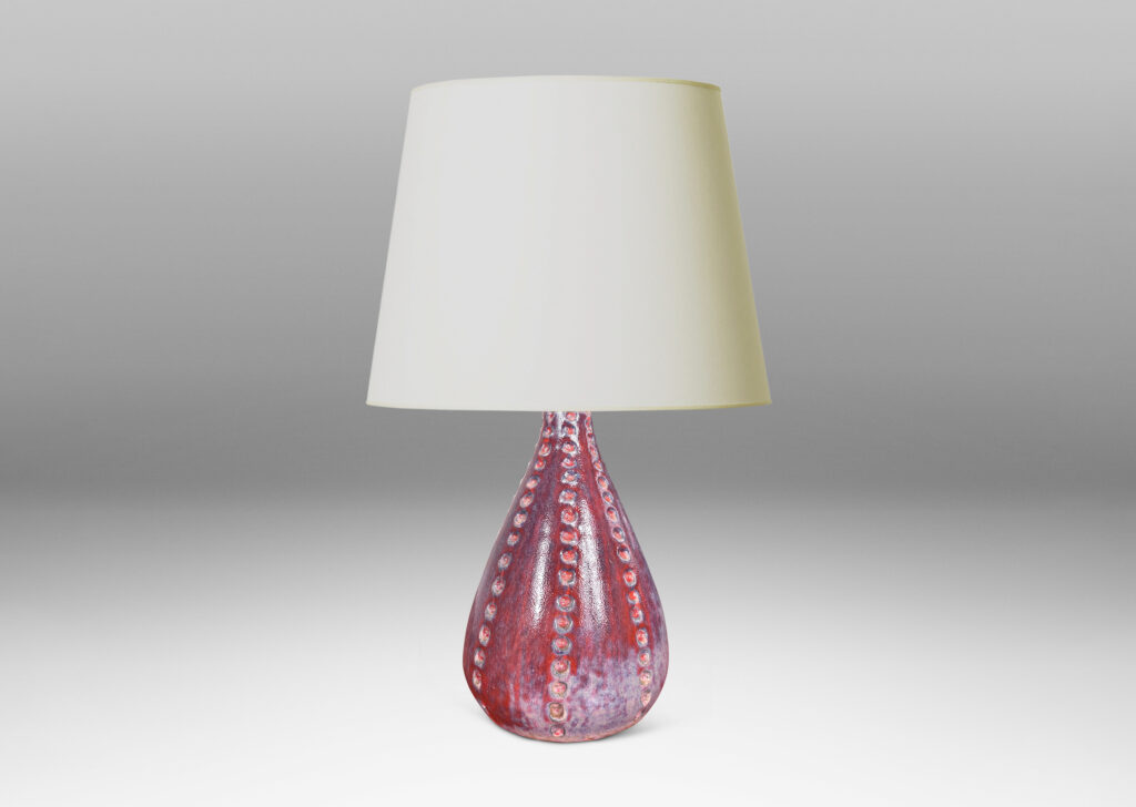 Gallery BAC echinoderm-evoking drop form with meridians of carved dots, glazed in shiny burgundy and light purple