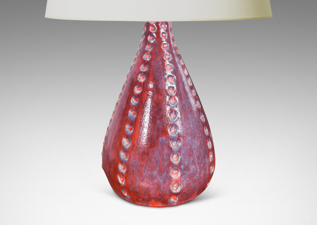 Gallery BAC echinoderm-evoking drop form with meridians of carved dots, glazed in shiny burgundy and light purple