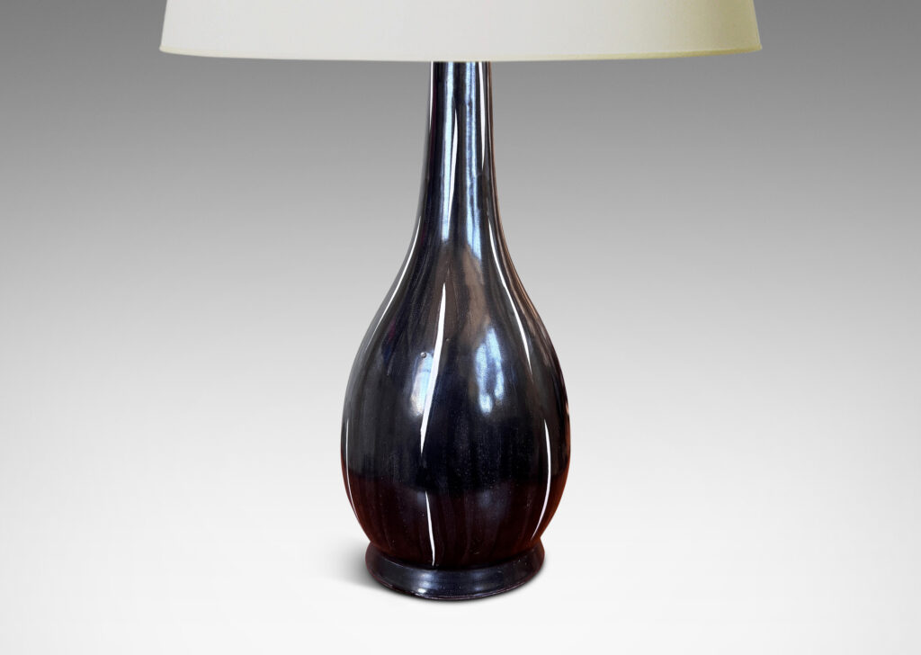 Gallery BAC organically modeled gourd form, glazed in black with white veining