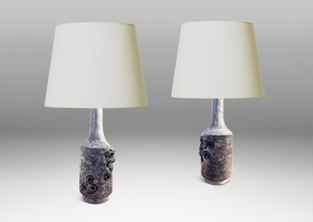 Gallery BAC cylindrical forms with attenuated necks, with textured surfaces and barnacle-like organic elements