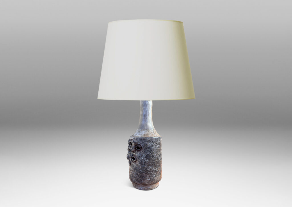 Gallery BAC cylindrical forms with attenuated necks, with textured surfaces and barnacle-like organic elements