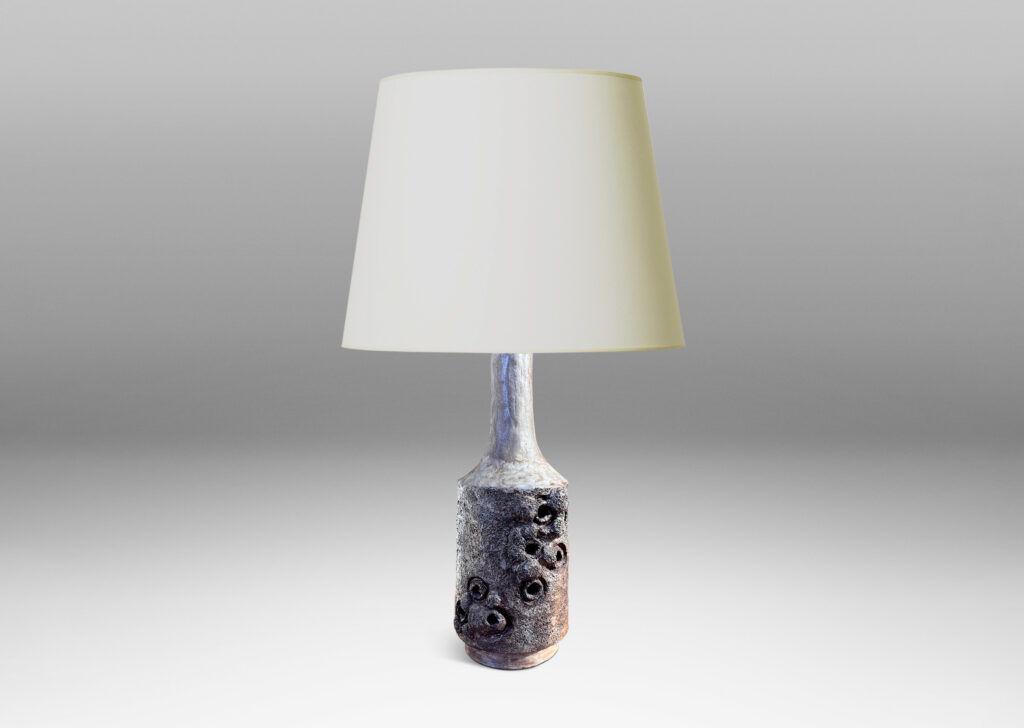 Gallery BAC cylindrical forms with attenuated necks, with textured surfaces and barnacle-like organic elements