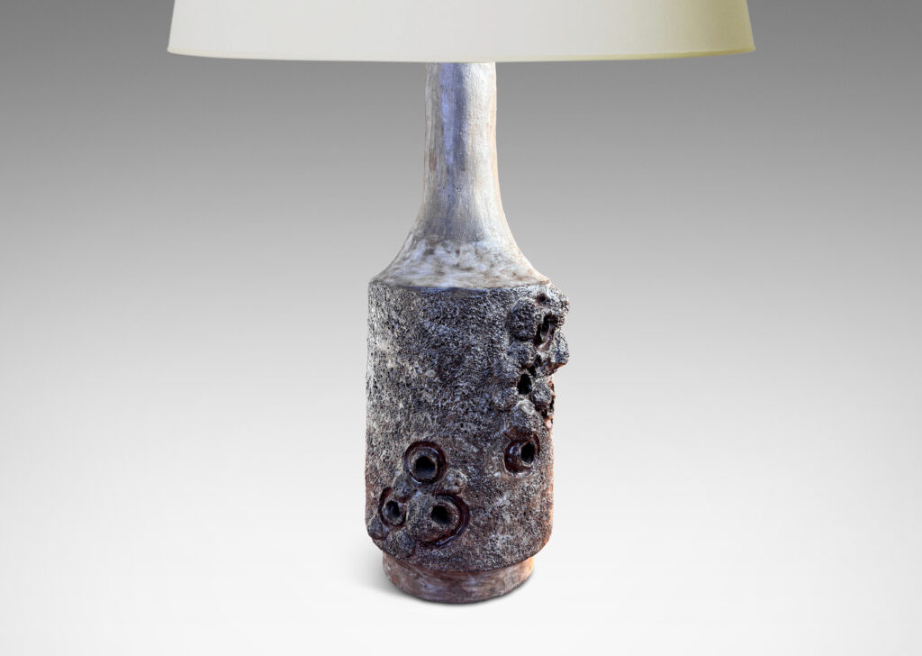 Gallery BAC cylindrical forms with attenuated necks, with textured surfaces and barnacle-like organic elements