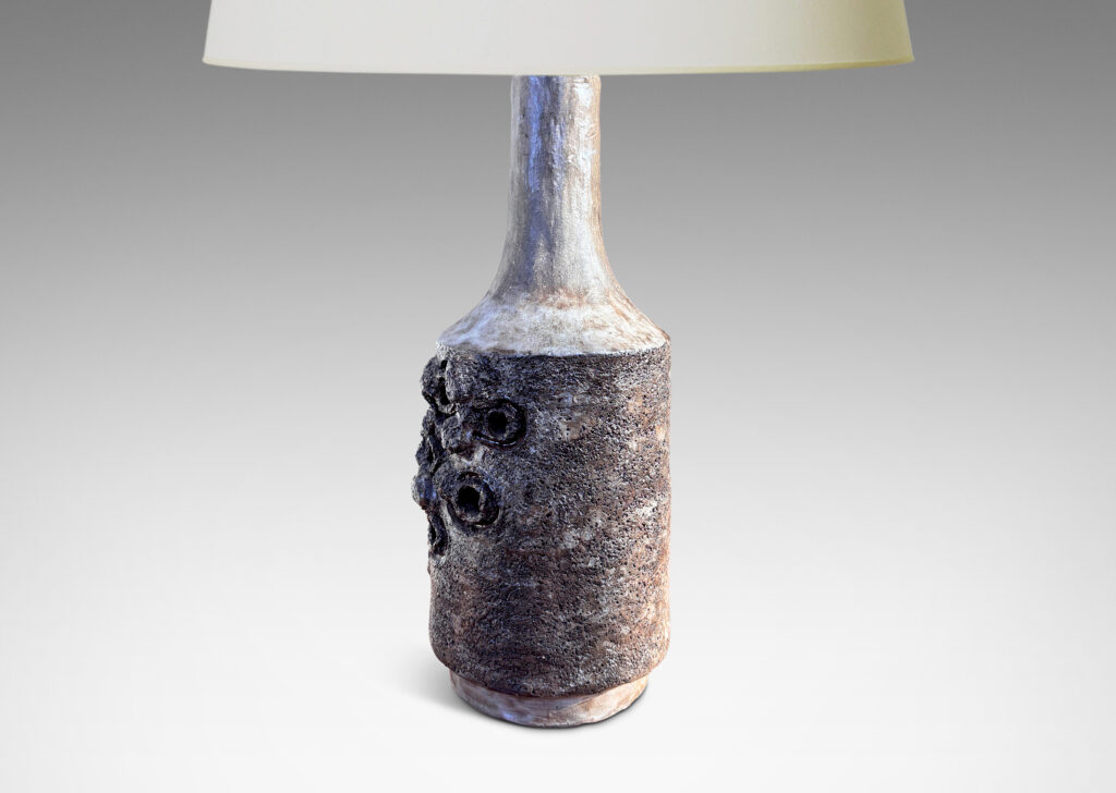 Gallery BAC cylindrical forms with attenuated necks, with textured surfaces and barnacle-like organic elements