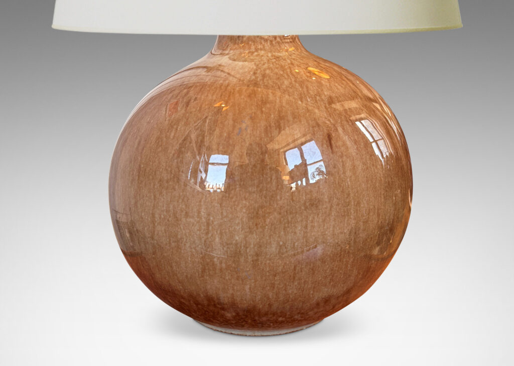Gallery BAC globe form glazed in a beachy flowing dappled brown