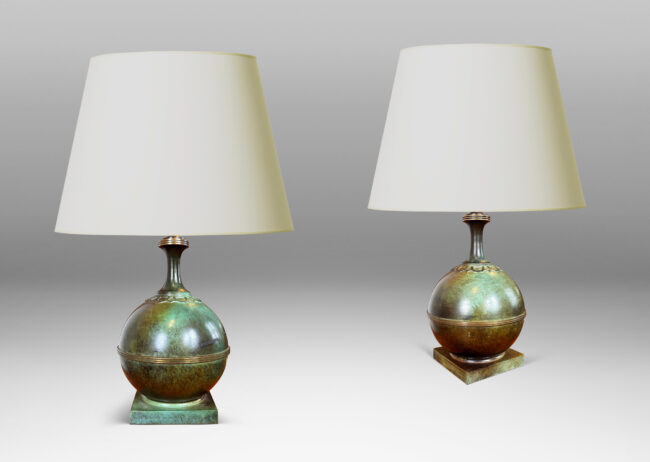 Gallery BAC globe forms on square plinths with collar ornaments and coved necks; high-quality cast bronze with a magnificent original patination featuring notable verdigris blue-green tones and burnished detailing