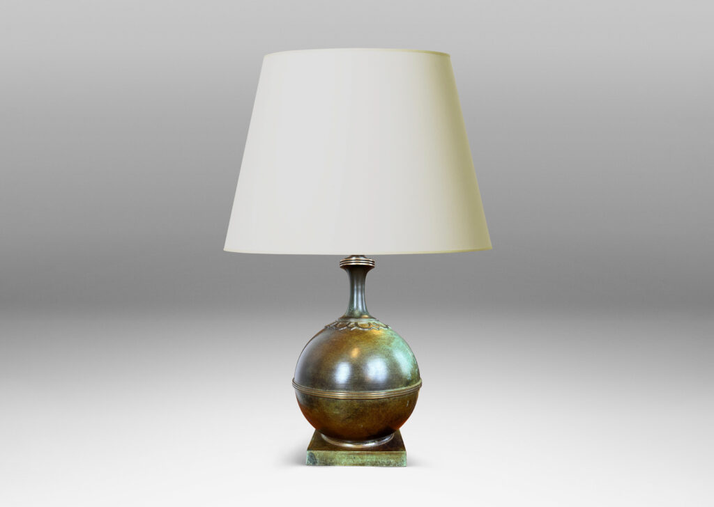 Gallery BAC globe forms on square plinths with collar ornaments and coved necks; high-quality cast bronze with a magnificent original patination featuring notable verdigris blue-green tones and burnished detailing