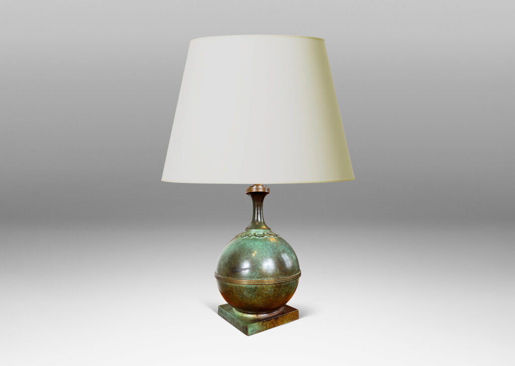 Gallery BAC globe forms on square plinths with collar ornaments and coved necks; high-quality cast bronze with a magnificent original patination featuring notable verdigris blue-green tones and burnished detailing