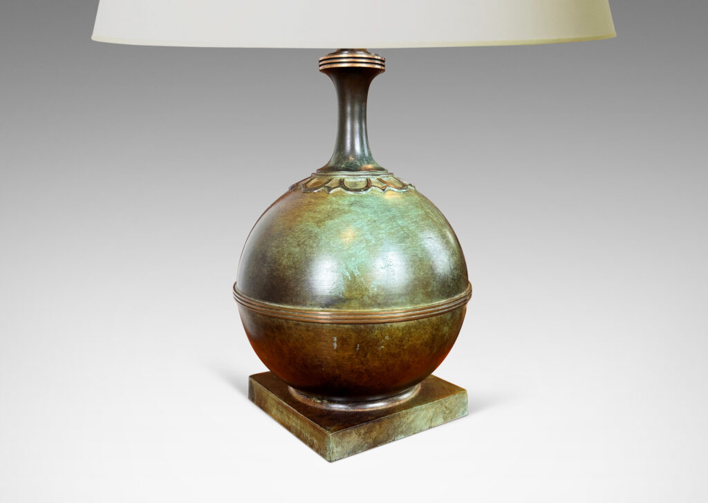Gallery BAC globe forms on square plinths with collar ornaments and coved necks; high-quality cast bronze with a magnificent original patination featuring notable verdigris blue-green tones and burnished detailing
