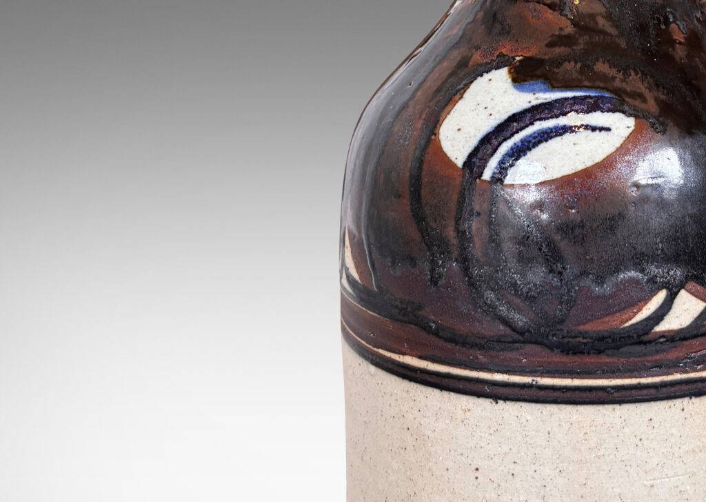 Gallery BAC arge bottle-like form with rounded shoulders and flared neck, in speckled pale gray ceramic