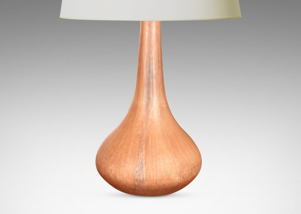 Gallery BAC organically modeled bulbous form with a tall attenuated neck, glazed in a matte sandy brown tones