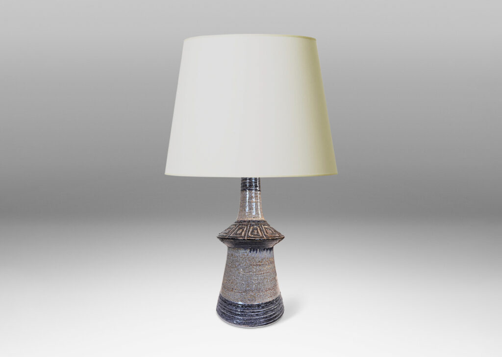 Gallery BAC notched conical form with carved banding and concentric square ornamentation, glazed in pale gray with black