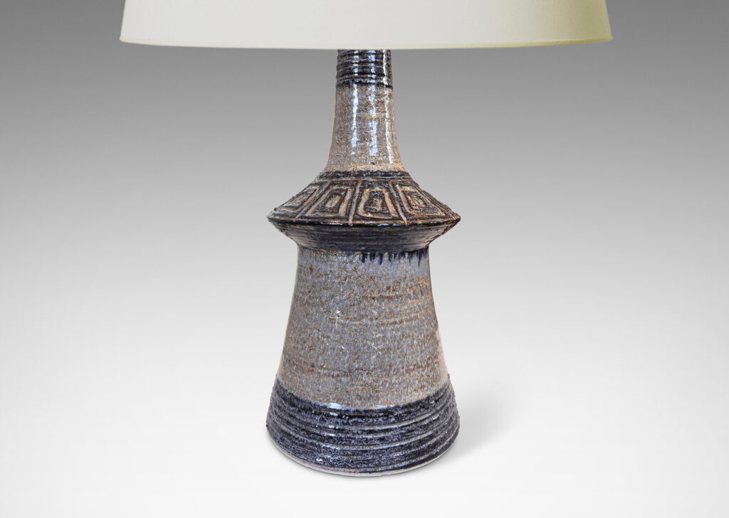 Gallery BAC notched conical form with carved banding and concentric square ornamentation, glazed in pale gray with black