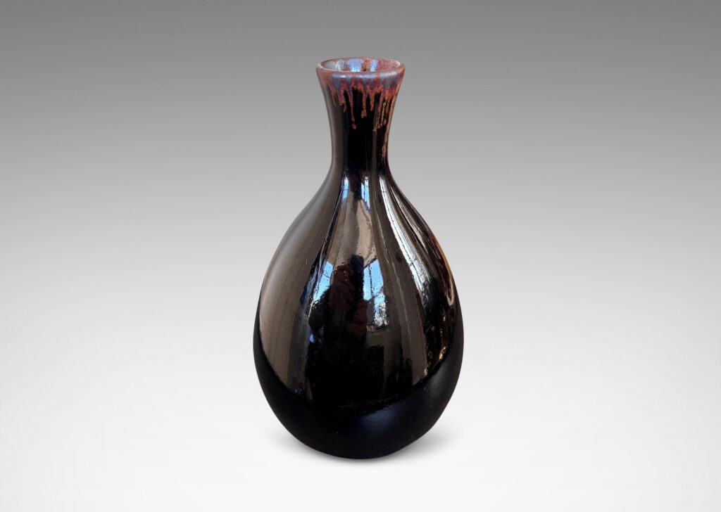 Gallery BAC sleek ovoid body and flared neck, glazed in a glossy brown with red luster accent to mouth