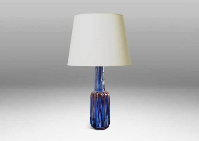 Gallery BAC tiered octagonal form with leaf-shaped panels, glazed in a luster blue with brown accents