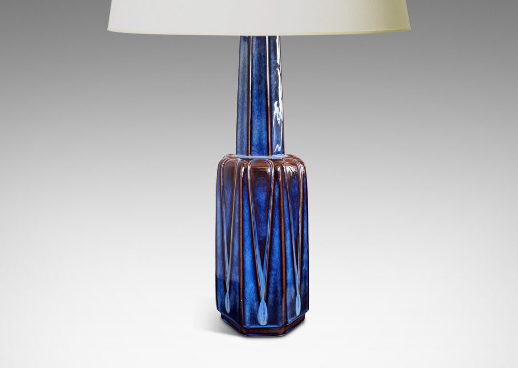 Gallery BAC tiered octagonal form with leaf-shaped panels, glazed in a luster blue with brown accents
