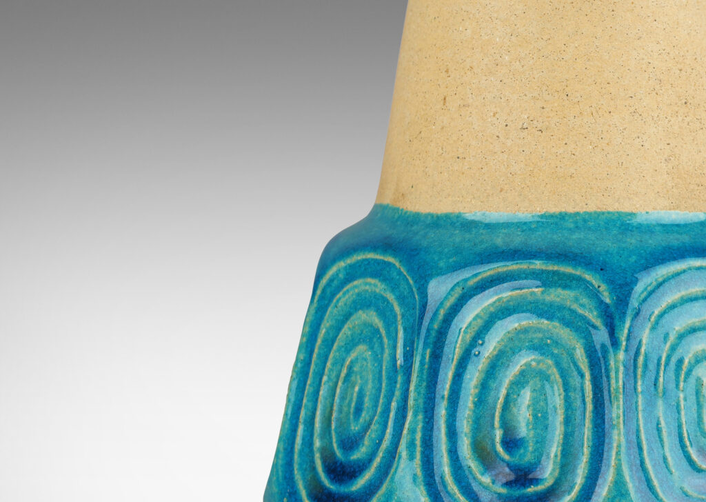 Gallery BAC conical form with collar of scrolling motifs, partially glazed in a shiny azure blue