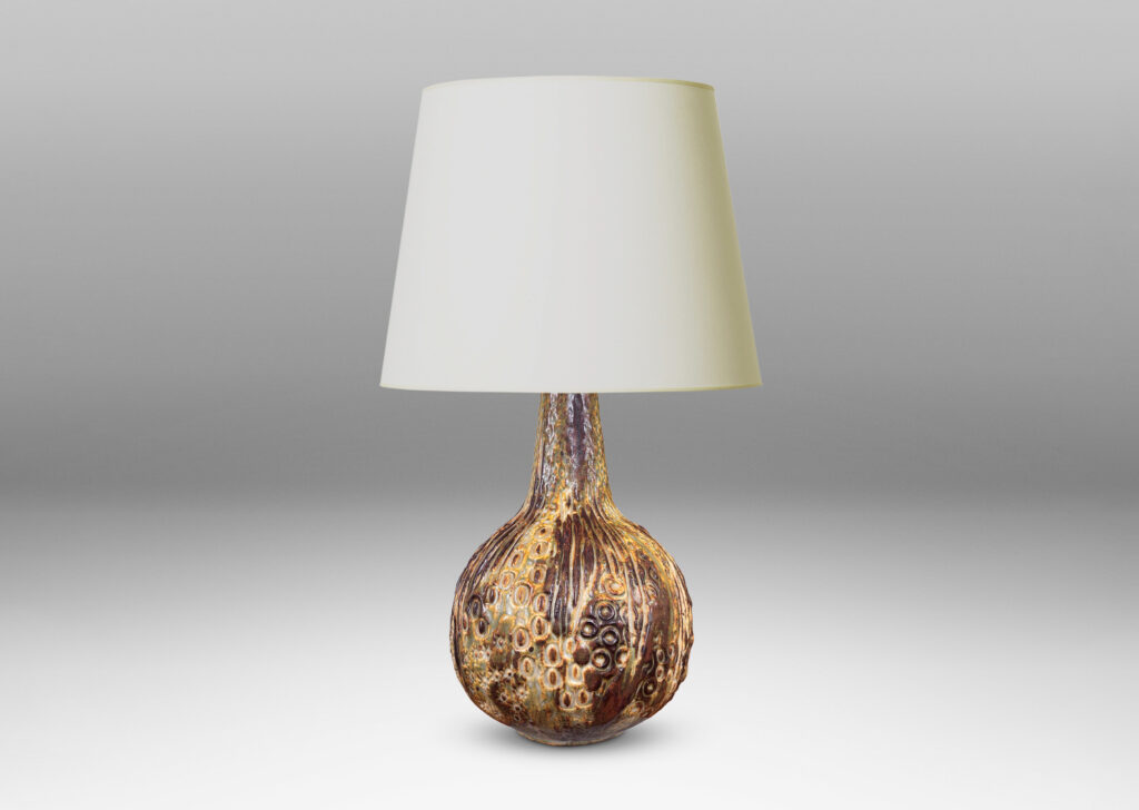 Gallery BAC bulbous form with organic reliefs evoking a seed pod, glazed in a pale taupe-brown