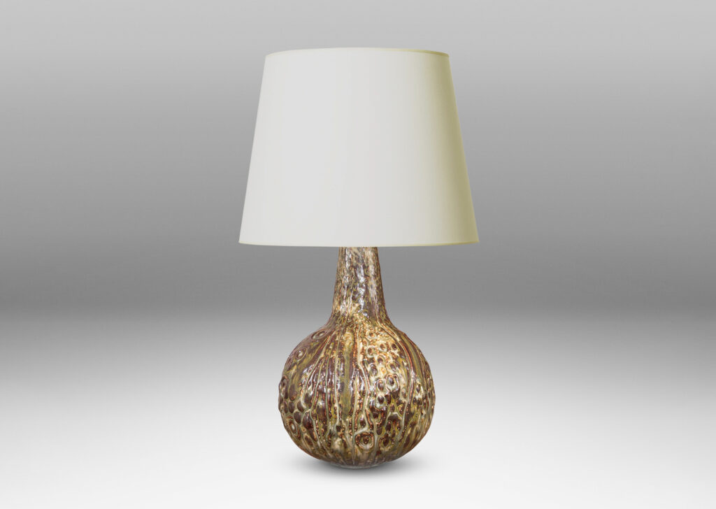 Gallery BAC bulbous form with organic reliefs evoking a seed pod, glazed in a pale taupe-brown