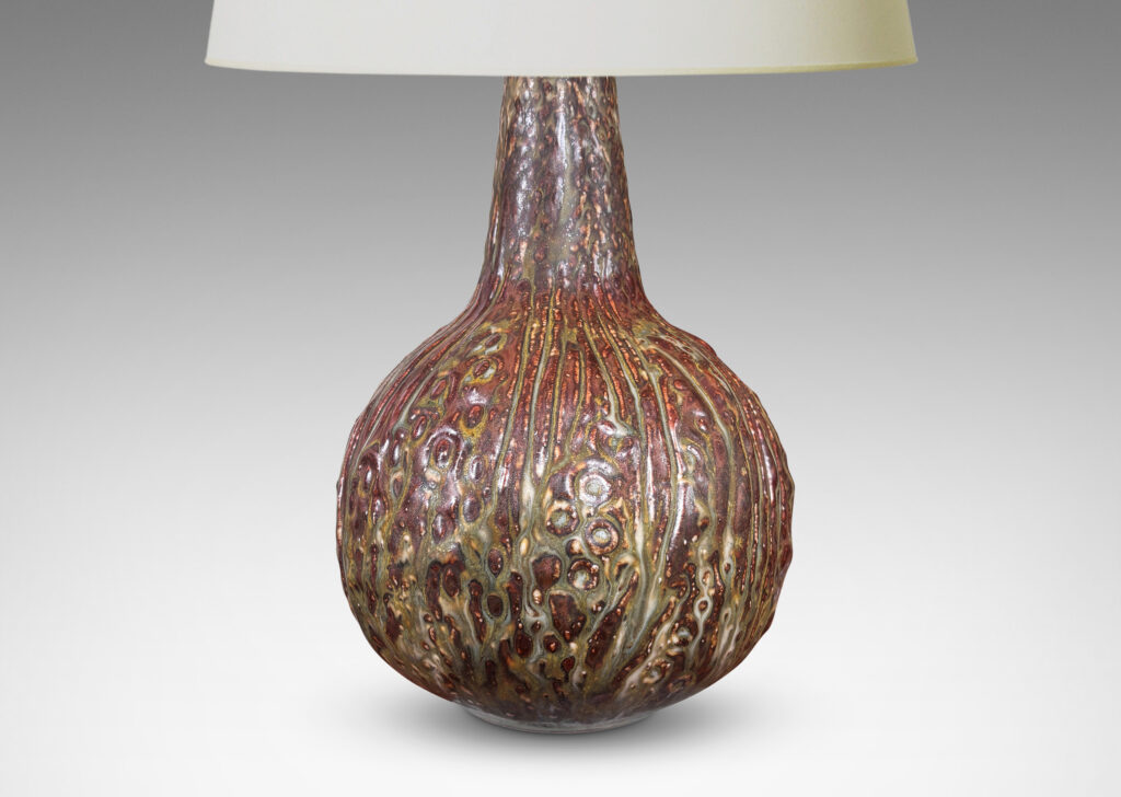 Gallery BAC bulbous form with organic reliefs evoking a seed pod, glazed in a pale taupe-brown