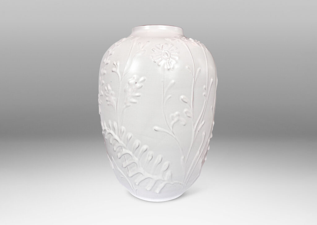 Gallery BACtapered form with slip-sculpted wildflowers in relief