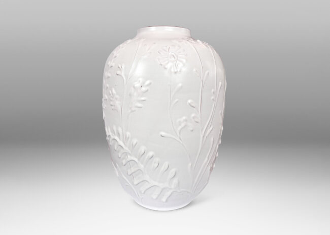 Gallery BACtapered form with slip-sculpted wildflowers in relief